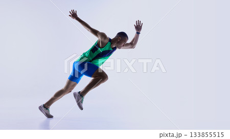 Runner advancing from crouched start into acceleration phase Runner advancing from crouched start into acceleration phase 133855515