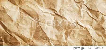 Wrinkled brown paper texture background 133858434