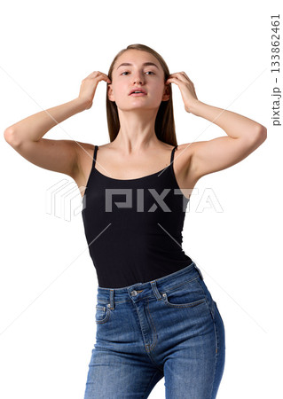 Slavic beauty in black top posing confidently Slavic beauty in black top posing confidently 133862461