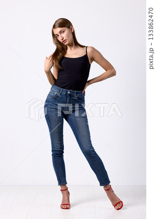 Slavic beauty in black top posing confidently 133862470