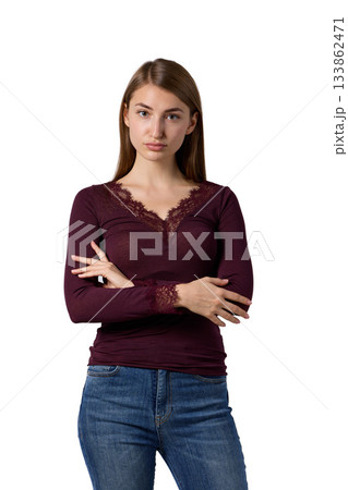 Slavic woman in burgundy lace top and jeans 133862471