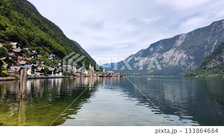 Hallstatt, Austria - July 27 2023: Beautiful Hallstatt Lake Hallstatt, Austria - July 27 2023: Beautiful Hallstatt Lake 133864684