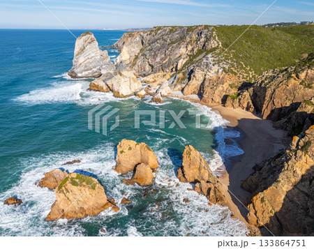 Cabo da Roca, Ursa Beach, Cliffs and Atlantic Ocean Waves on Sunny Day. Aerial View. Portugal 133864751