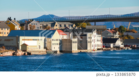 Warehouses and docks along the calm harbor of Kristiansund, Norway Warehouses and docks along the calm harbor of Kristiansund, Norway 133865870