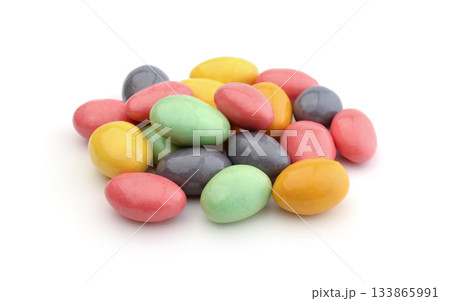 Almonds covered with colorful glaze isolated. Almonds covered with colorful glaze isolated. 133865991