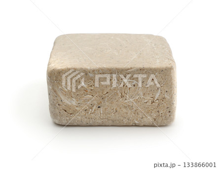 Peanut halva isolated on white. 133866001