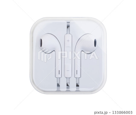 Headphones in a plastic case isolated on white. 133866003