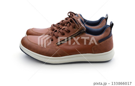 Pair of new brown leather men's shoes isolated. 133866017