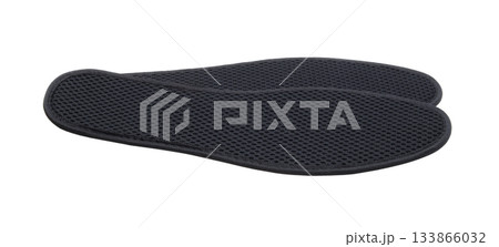 Textile shoe insoles isolated on white. Textile shoe insoles isolated on white. 133866032