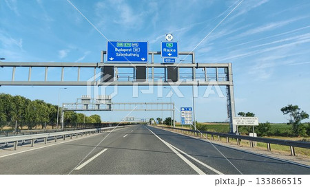 Prague, Czech - July 23 2023: Czech Toll Road Heading towards Budapest Prague, Czech - July 23 2023: Czech Toll Road Heading towards Budapest 133866515