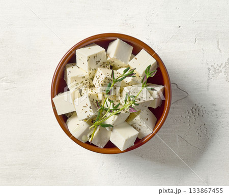 bowl of fresh greek cheese cubes 133867455