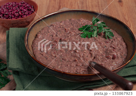 Red bean lobio,a traditional Georgian dish, on a wooden table, homemade, 133867923