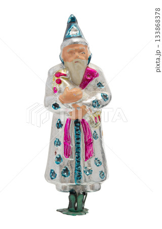 Vintage glass Christmas ornament: Father Frost wizard figure in a silver coat isolated on white background Vintage glass Christmas ornament: Father Frost wizard figure in a silver coat isolated on white background 133868378