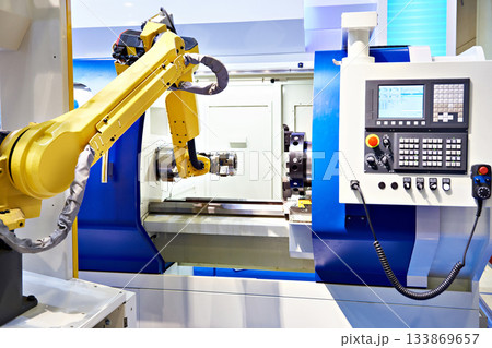 Robotic arm and cnc lathe Robotic arm and cnc lathe 133869657