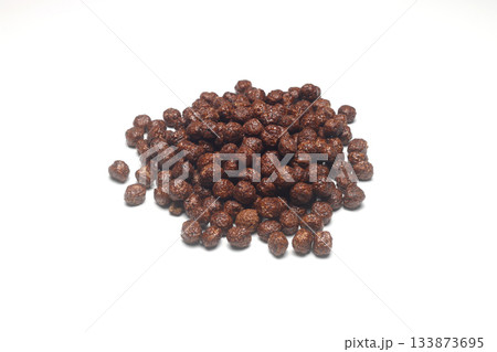 Healthy muesli with oat flakes, nuts and raisins isolated on white background. Healthy muesli with oat flakes, nuts and raisins isolated on white background. 133873695