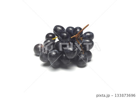 Black grapes on a white background. Fresh juicy grapes Black grapes on a white background. Fresh juicy grapes 133873696