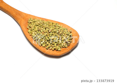 Heap of Dry thyme in wooden spoon isolated on white background. Dried spice concept. Selective Focus 133873919