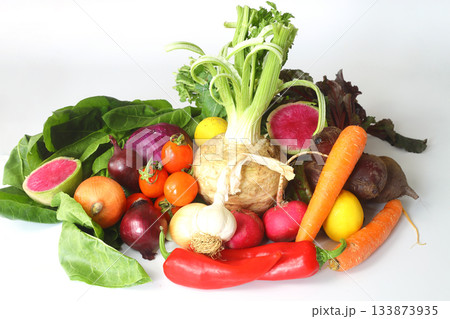 Various raw vegetables are isolated on a white background. Various raw vegetables are isolated on a white background. 133873935