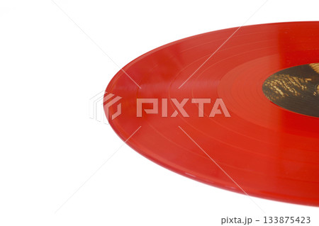 Red Vinyl record on a white background. Retro style. Top view. Flat lay, copy space. 133875423