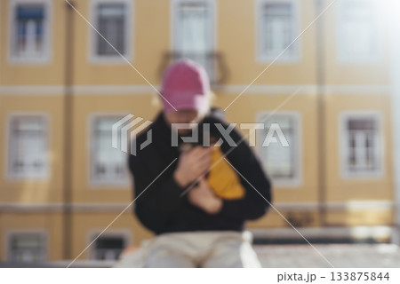 Softfocused cityscape featuring cheerful puppy and pastel buildings Softfocused cityscape featuring cheerful puppy and pastel buildings 133875844