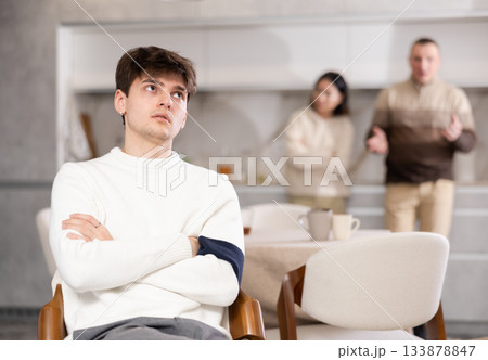 Adult man and young woman quarrel with guy 133878847