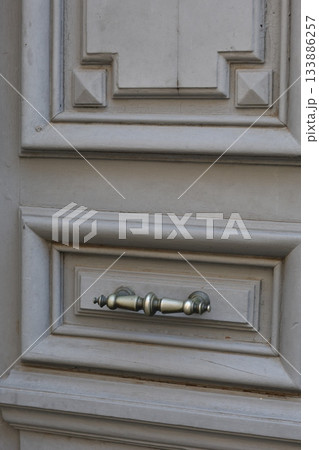 Vintage wooden door element. Vertical white retro door. Vintage wooden door element. Vertical white retro door. 133886257