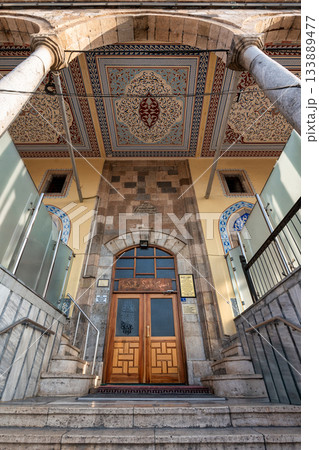 Kapi Mosque entrance with ornate ceiling and traditional architecture in Konya, Turkey. 133889477