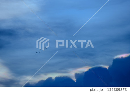 The cloud has rainbow colors. 133889878