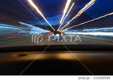 Road view while driving, shot from inside the car. Road view while driving, shot from inside the car. 133889889