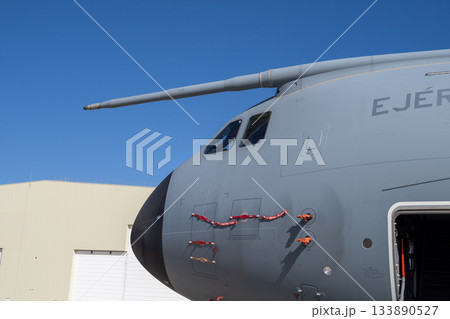Cockpit section of military airlifter with refueling probe and access door 133890527