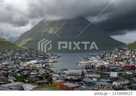 Breathtaking panoramic view of Klaksvik city, nestled among fjords and mountains in the Faroe Islands, Denmark, North Atlantic. 133890627