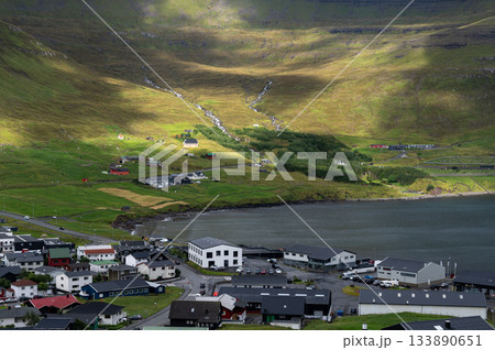 Breathtaking panoramic view of Klaksvik city, nestled among fjords and mountains in the Faroe Islands, Denmark, North Atlantic. Breathtaking panoramic view of Klaksvik city, nestled among fjords and mountains in the Faroe Islands, Denmark, North Atlantic. 133890651