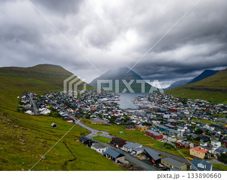 Breathtaking panoramic view of Klaksvik city, nestled among fjords and mountains in the Faroe Islands, Denmark, North Atlantic. 133890660