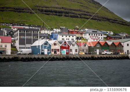 Breathtaking panoramic view of Klaksvik city, nestled among fjords and mountains in the Faroe Islands, Denmark, North Atlantic. Breathtaking panoramic view of Klaksvik city, nestled among fjords and mountains in the Faroe Islands, Denmark, North Atlantic. 133890676