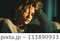Young woman contemplating, experiencing sadness and loneliness 133890933