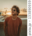 Man pilot traveler enjoying sunset at airplane 133890939