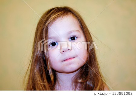 Beautiful happy toddler child girl smiling, natural emotions. Long hair, adorable girl 133891092