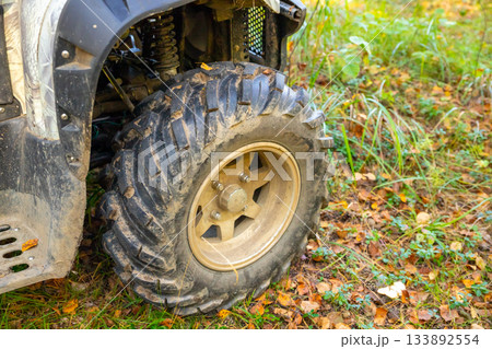 front right wheel of an ATV 133892554