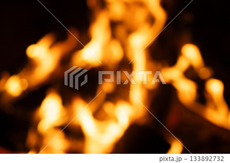 Abstract Fire Bokeh Background: Blurred Orange and Yellow Flames. 133892732