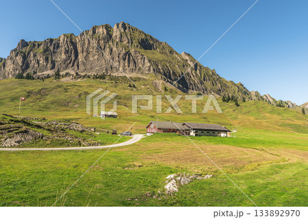 Mountain scenery and farmhouse in the Swiss Alps, Pragelpass, Muotathal, Canton Schwyz, Switzerland 133892970
