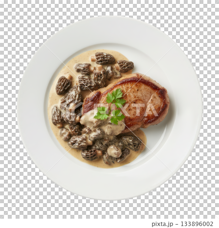 Delicious gourmet veal chop dinner with morel mushroom and rich savory cream sauce on white plate from above Delicious gourmet veal chop dinner with morel mushroom and rich savory cream sauce on white plate from above 133896002