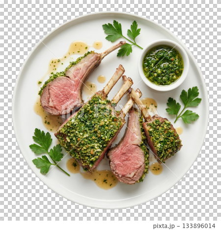 Gourmet roasted rack of lamb persillade, an appetizing main course with savory green herb crust and parsley garnish 133896014