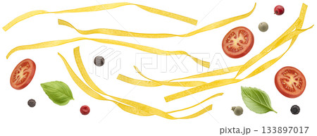 Fettuccine pasta with basil leaves, spices and tomato slices isolated on white background 133897017