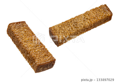 Rye croutons, rusk sticks isolated on white background with clipping path Rye croutons, rusk sticks isolated on white background with clipping path 133897029