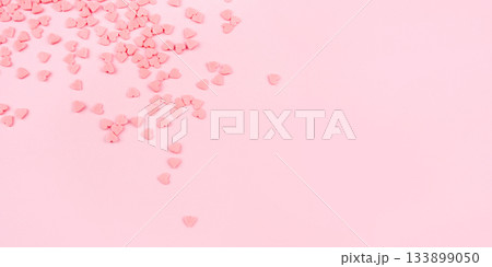 Pink background with tiny hearts. Valentine's day concept. Pink background with tiny hearts. Valentine's day concept. 133899050