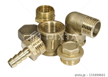 Brass fittings for plumbing pipeline on a white surface 133899681
