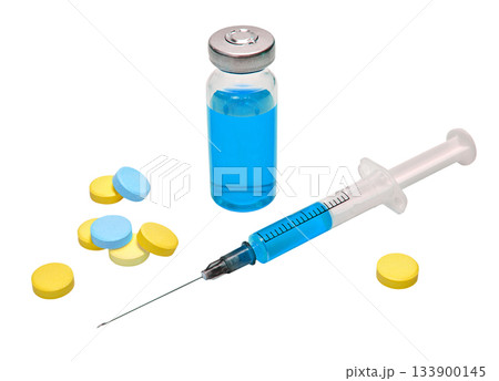 Blue vaccine in vial with syringe and multicolor tablets on a white background Blue vaccine in vial with syringe and multicolor tablets on a white background 133900145