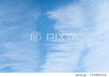 Clear blue sky with white cloud background Clear blue sky with white cloud background 133900338