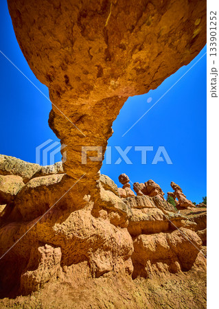 Red Canyon Utah Natural Rock Arch and Hoodoo Formations Against Clear Blue Sky 133901252