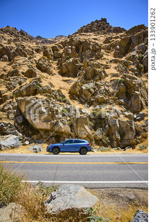 Subaru SUV On Roadside With Rocky Hillside And Blue Sky Sequoia National Forest 133901262